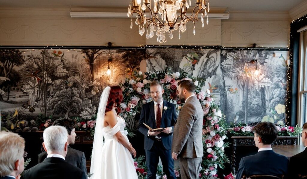 Wedding scene with Bride and Groom and Guests